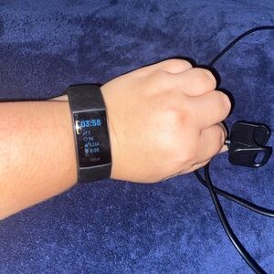 Fitbit Black Smartwatch with Blue Display